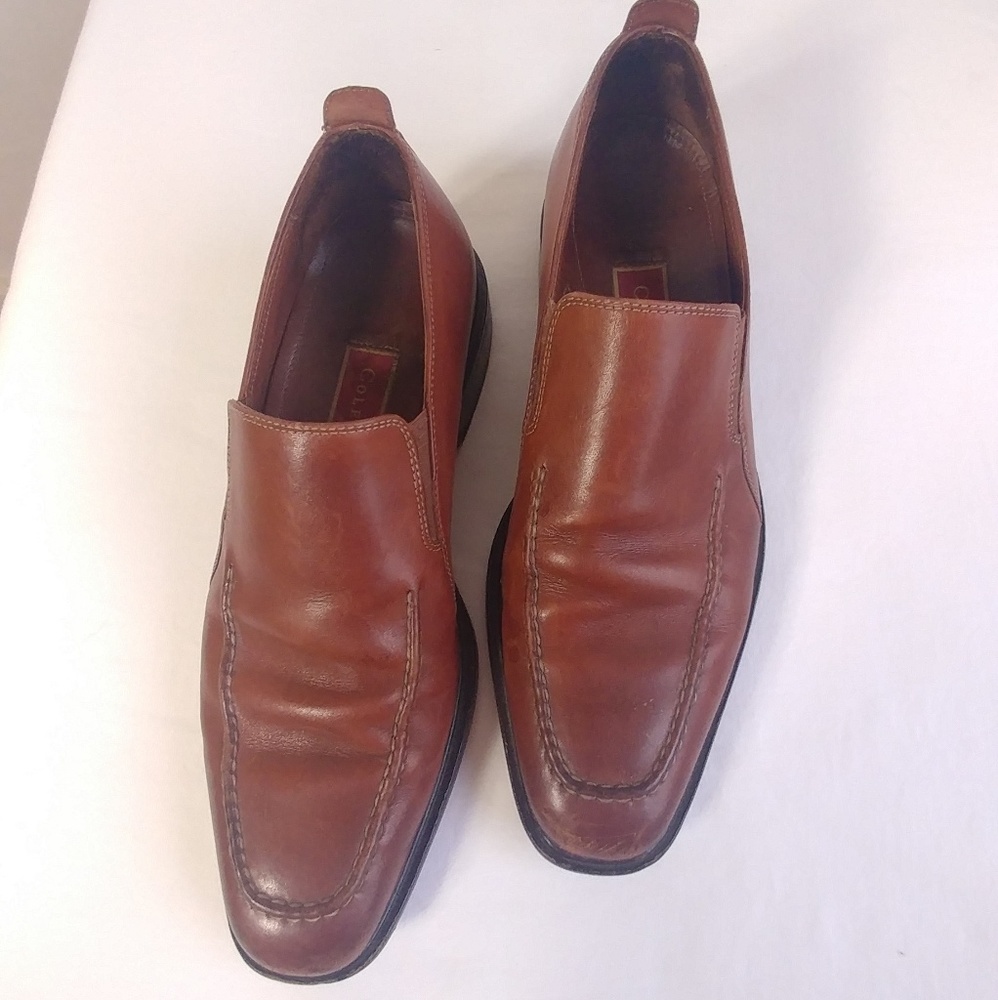 Cole Haan brown dress shoes/slip-ons.